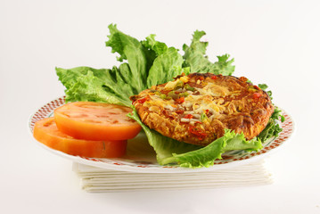 pizza on slice tomatoe