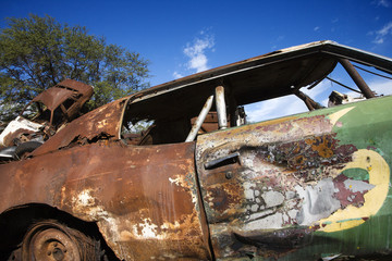 old abandoned and rusted car.