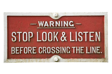 old railway warning sign