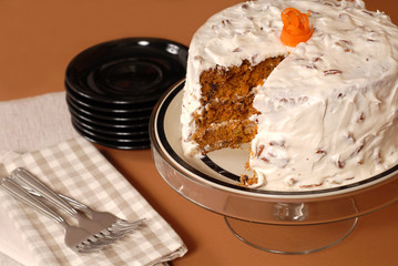 whole carrot cake with cream cheese and pecan frosting