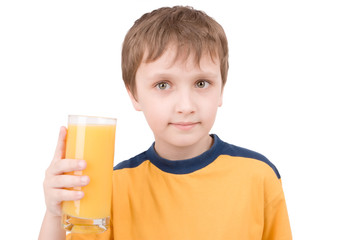 young boy with orange juice