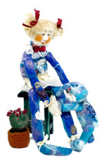 doll playing with elephant