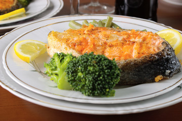 Roasted salmon steak with broccoli