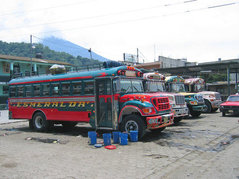 old shool bus  in the road station, guatemala