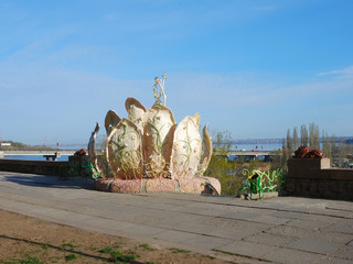 stone flower monument and ladder