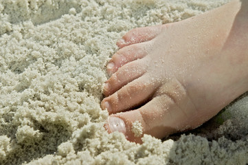 kids foot in sandy beach fun