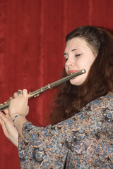 woman playing flute