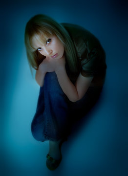 blond girl sitting