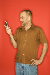 Caucasian man with cellphone.