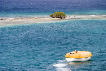 lifeboat near desert island
