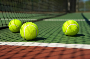 tennis balls on court