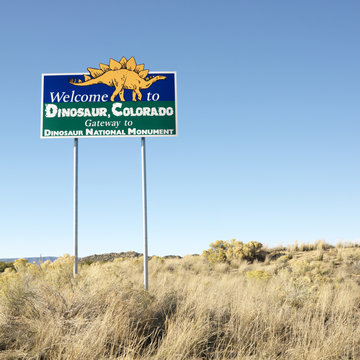 welcome sign for city of dinosaur, colorado, usa.