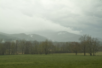 clouds and rain over smoky mountains
