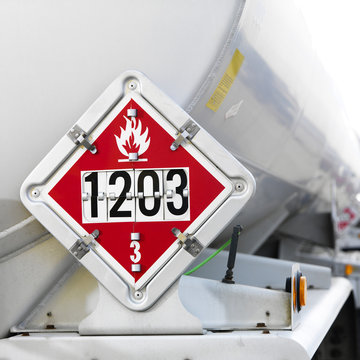 flamable caution sign on back of fuel tanker