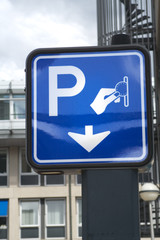 payed parking sign