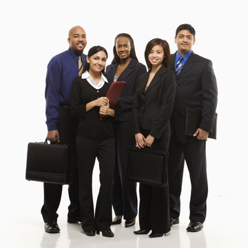 business group of men and women standing with briefcases.
