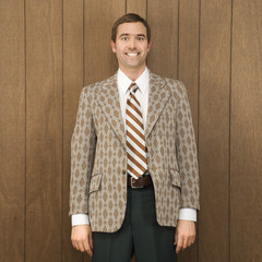 portrait of smiling man in retro suit