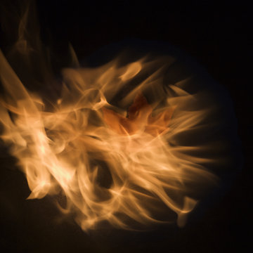 maple leaf in flames.