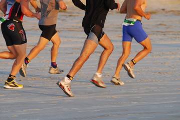 running legs on beach