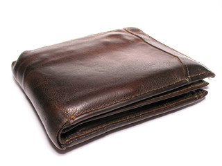 an old brown leather wallet isolated on white.