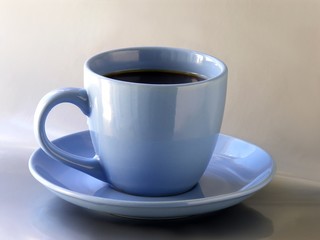 a blue cup of strong black coffee