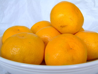 white plates with fruit - oranges 4