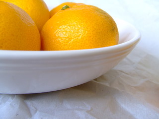 white plates with fruit -oranges 3