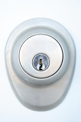 metallic door lock with keyhole