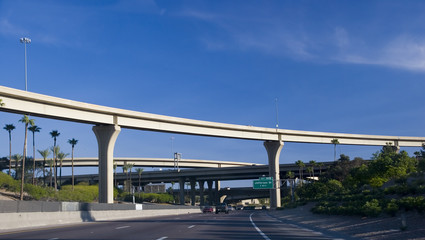 highway interchange above palms
