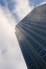 Fototapeta na wymiar office tower and clouds