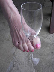 wine glass between toes