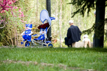 cartoon baby carriage on the lawn