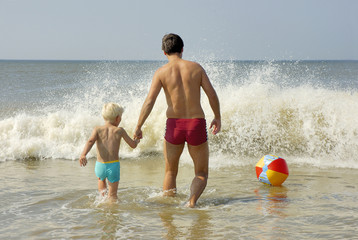 father and son at the beach