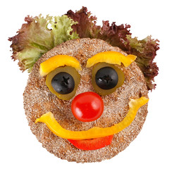 happy face made of vegetables and bread