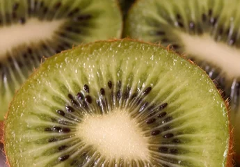 Papier Peint photo Tranches de fruits kiwi