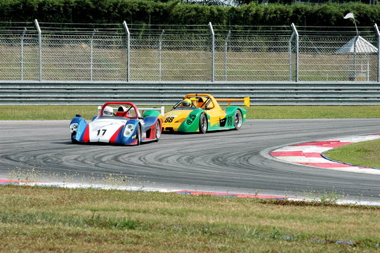 racing cars at a track