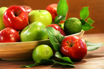 red and green apples in a bowl