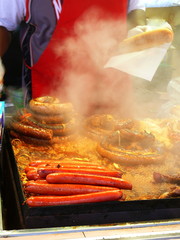 vendor cooking sausages