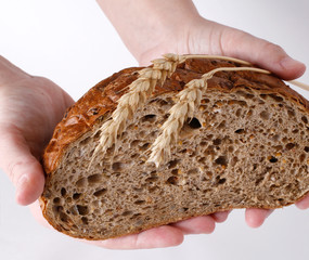 bread, wheat-ears and hands