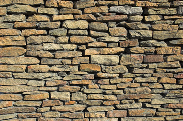 background: colorful stone wall