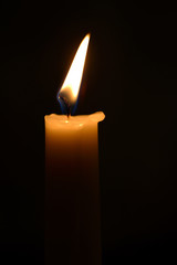 etude with burning candle