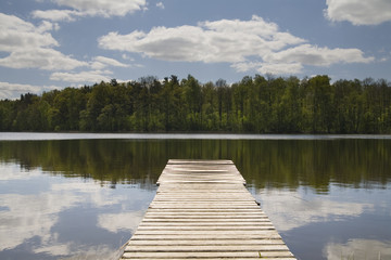 wooden pier on the lake - Powered by Adobe