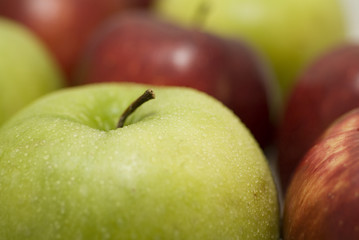 fresh apple with drops of water.