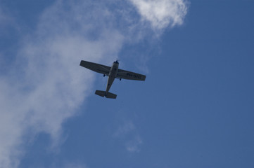 small airplane blue sky