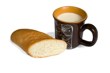 white bread and a mug with milk.