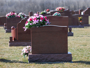tombstones with flowers