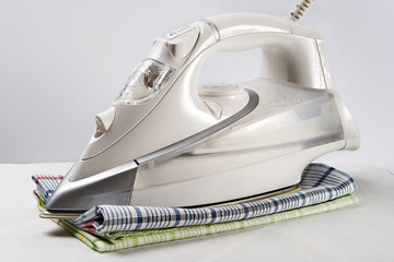 white iron and towels