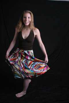 pretty woman swinging her dress