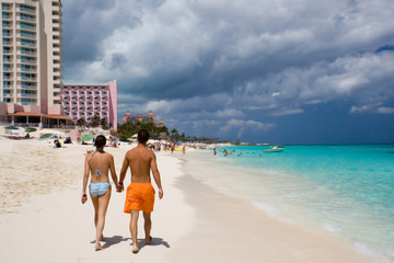 couple walking along the beach
