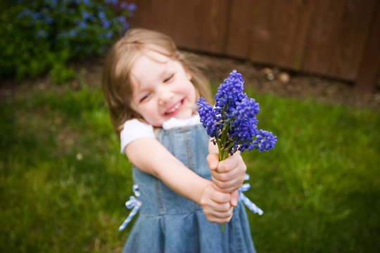 girl holding flowers
